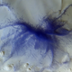 A color-composite image showing track marks left behind by the convergence of hundreds, and possibly thousands, of dust devils on Mars.